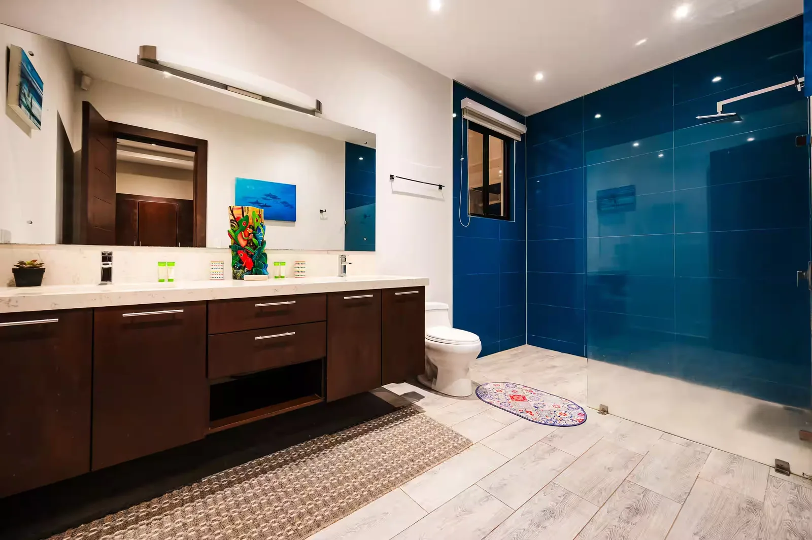 One of the villa's bathrooms, with a double vanity and walk-in rain shower